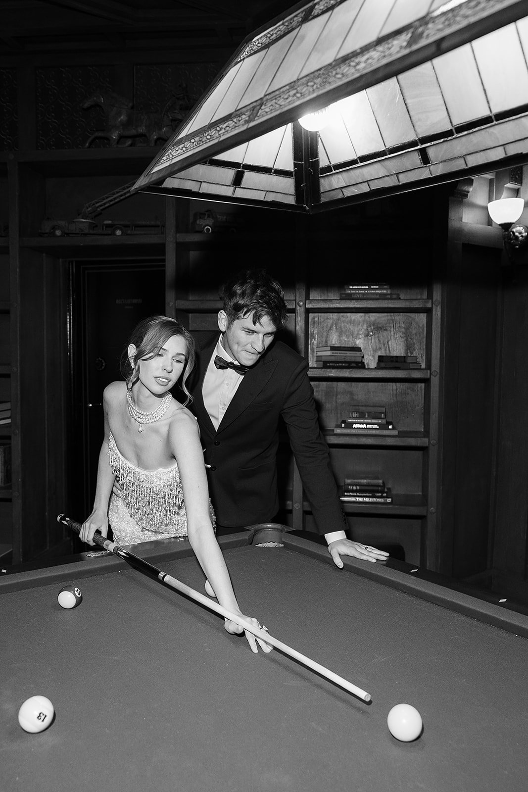 Editorial couple portrait in a vintage styled interior